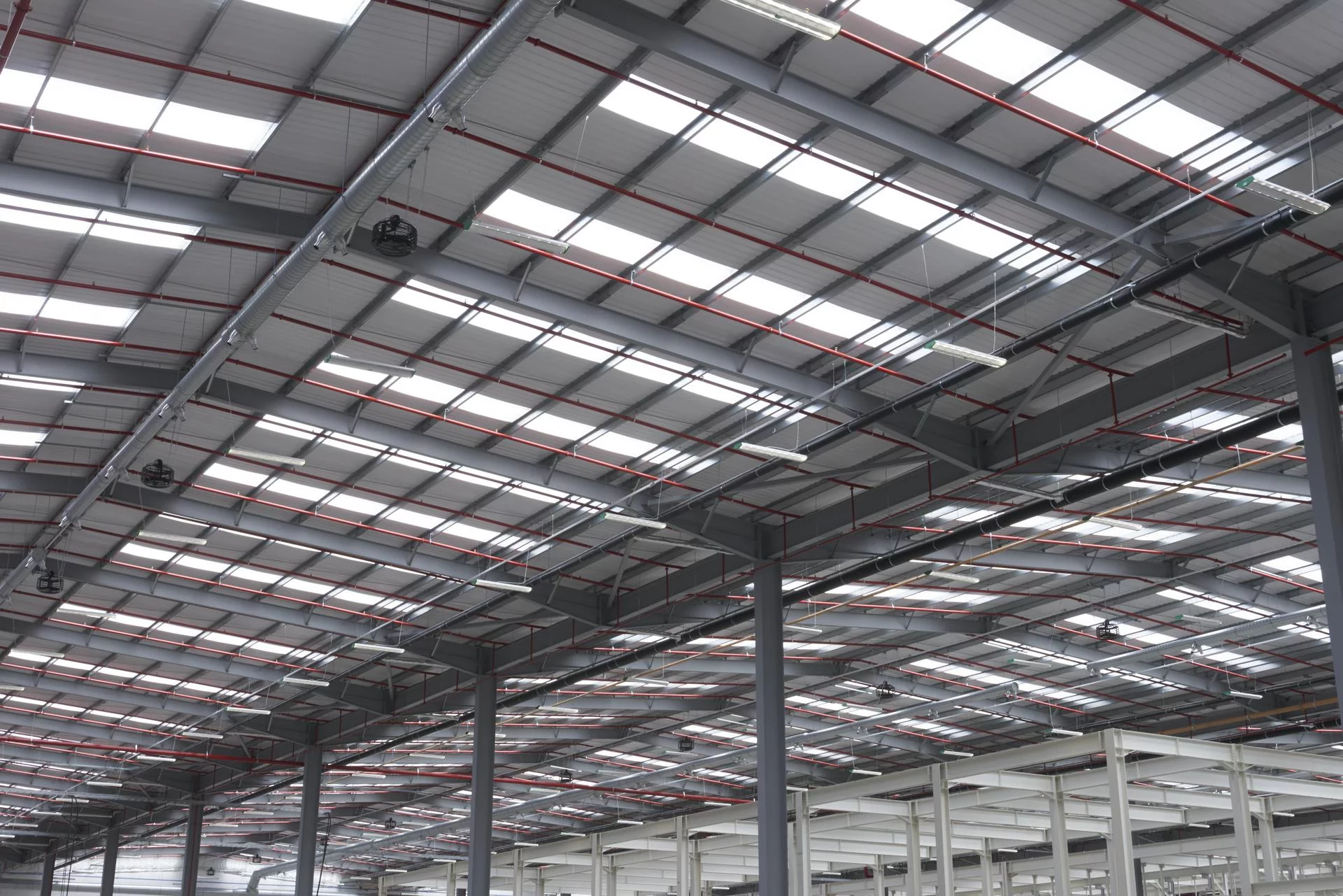 Wide-angle view of the fire suppression ceiling grid and high-risk deluge system installed by Alpine Fire Engineers in the BAE Systems Eurofighter Hangar.